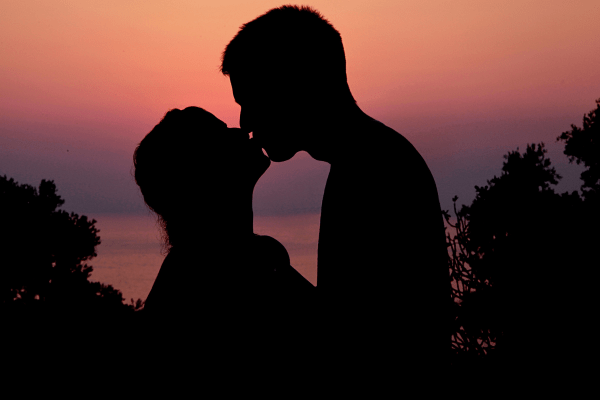 Experience the warmth of a sunset kiss while pondering the question: Do best friends kiss? Delve into friendship dynamics and platonic expressions.